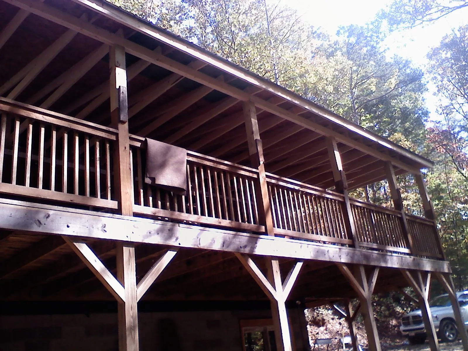 Timber framing under a new elevated porch and deck — Roof Leak Repair in Guilderland by Roofing Brothers